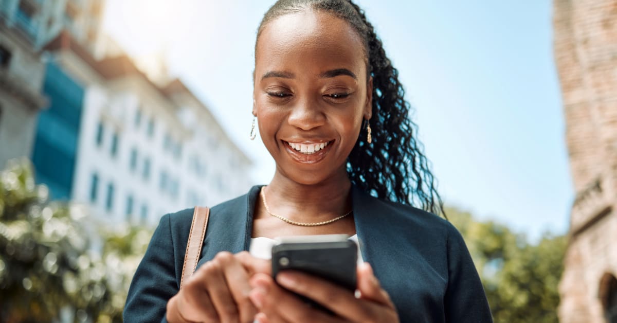 Woman receiving SMS marketing campaign Woman receiving SMS marketing campaign
