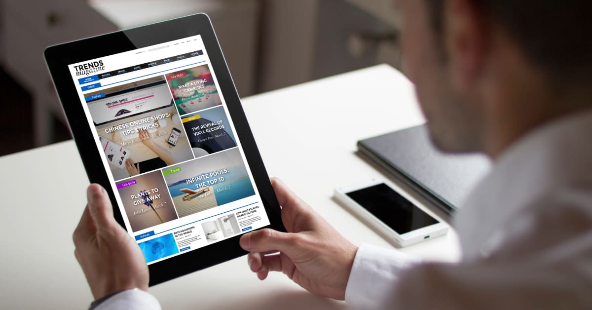 Entrepreneur checking their website's evergreen content display Entrepreneur checking their website's evergreen content display